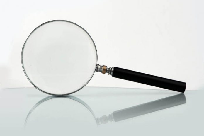 audit magnifying glass