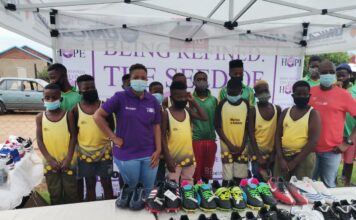 New soccer boots donated to soccer club in Ramotse